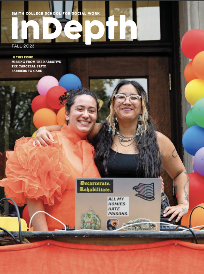 Cover of InDepth magazine from Fall 2023 featuring two students standing in front of a PRIDE balloon arch with a laptop open in front of them.