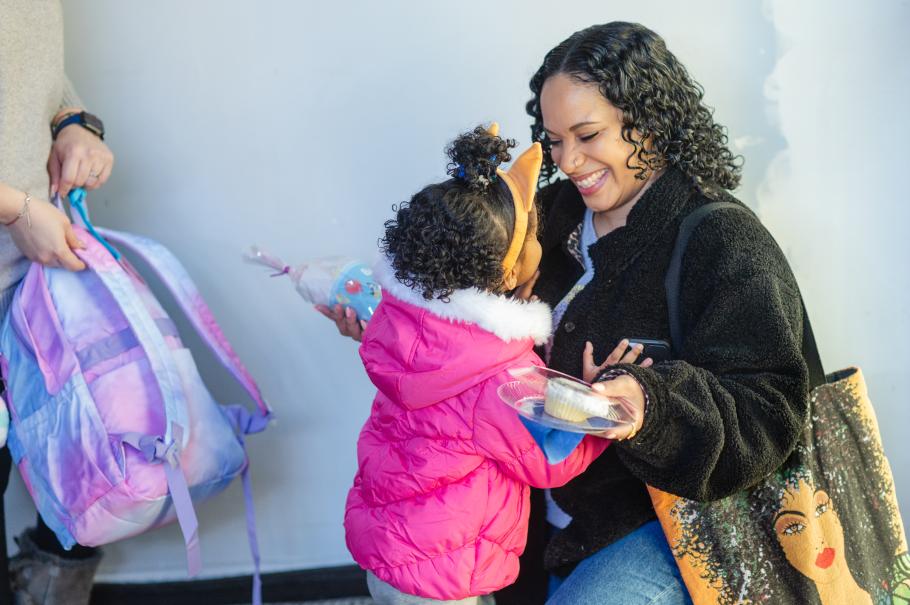 Emely and her daughter at school.