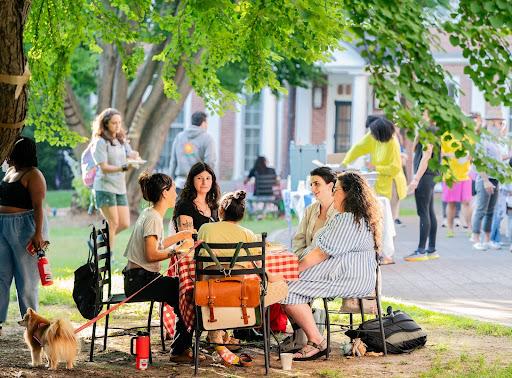 A table of SSW students at the barbeque