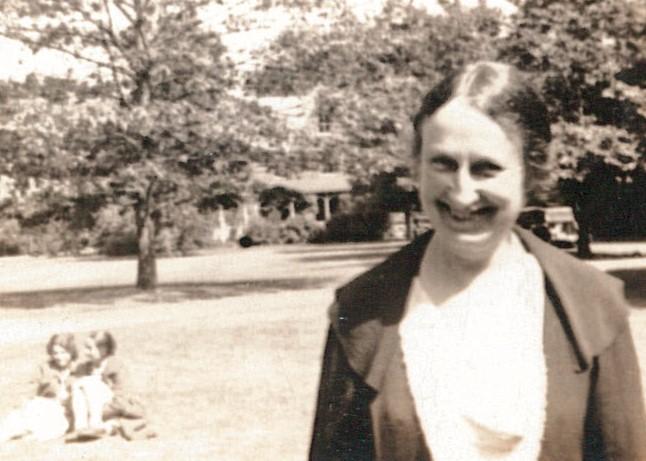 Photo of Bertha Capen Reynolds taken outside. 