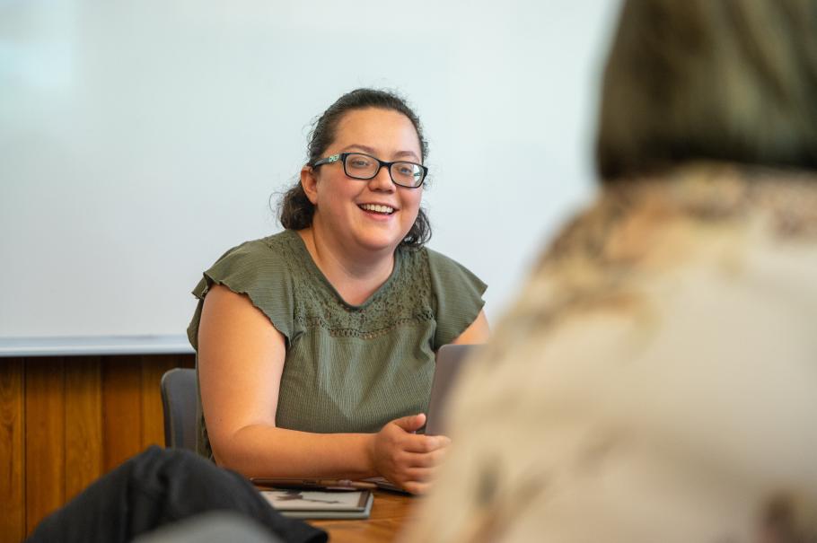 A student participates in a doctoral seminar session.