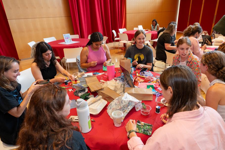 Alexis Minnis works alongside other students at a summer gathering in celebration of Juneteenth