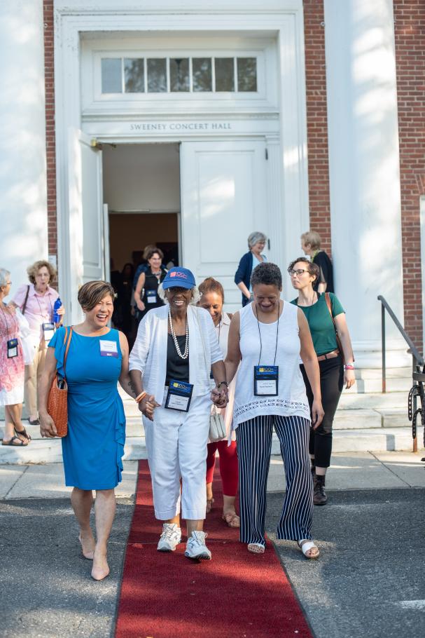 Dean Yoshioka walks with Juanita Dalton Robinson, M.S.W. ’51, and her daughter, Rachel Robinson, M.S.W. ’94 during the School’s Centennial celebration. 