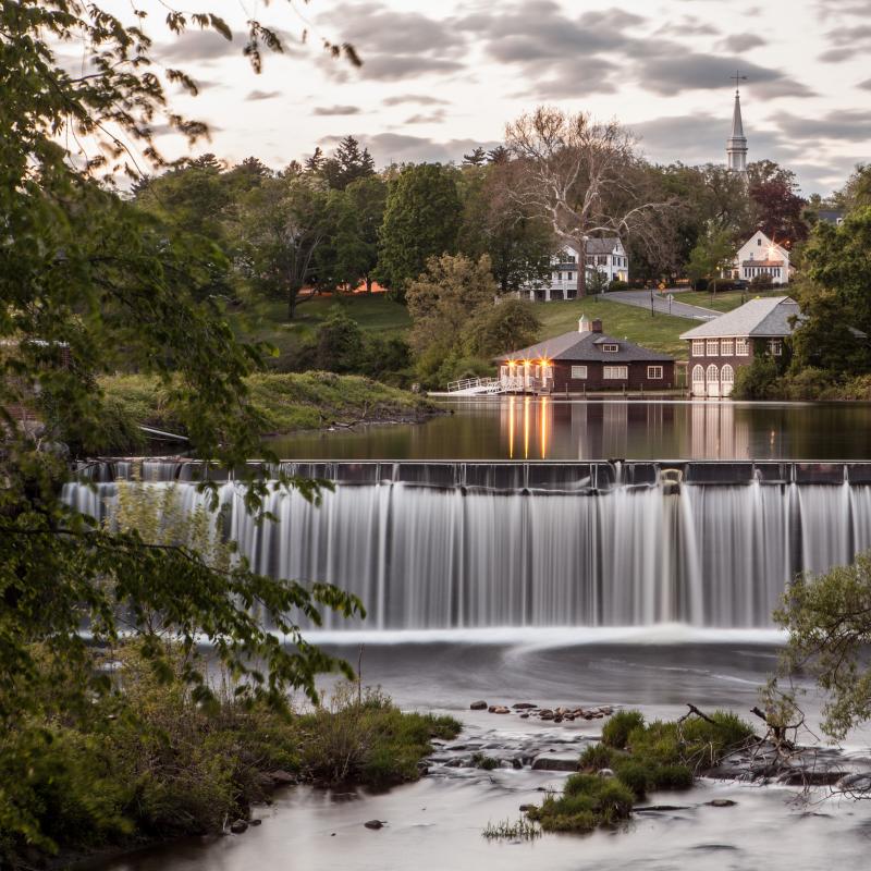 The Boat House on Paradise Pond at Smith College with the waterfall in the foreground.