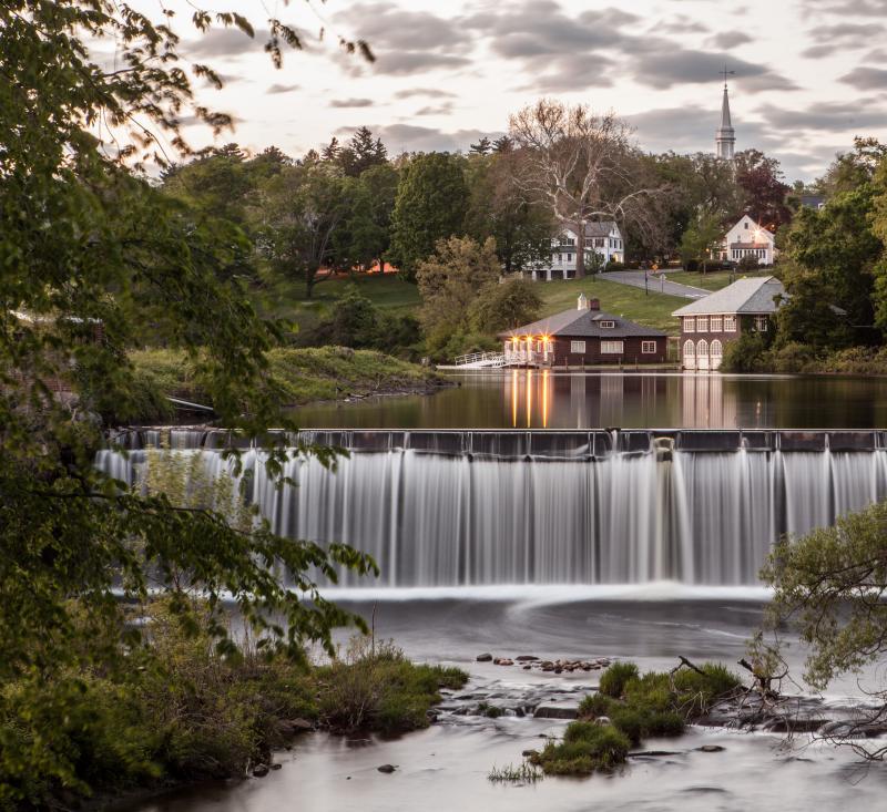 The Boat House on Paradise Pond at Smith College with the waterfall in the foreground.