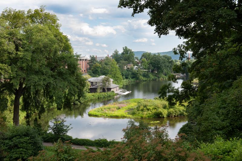 Paradise Pond at Smith College surrounded by lush greenery.