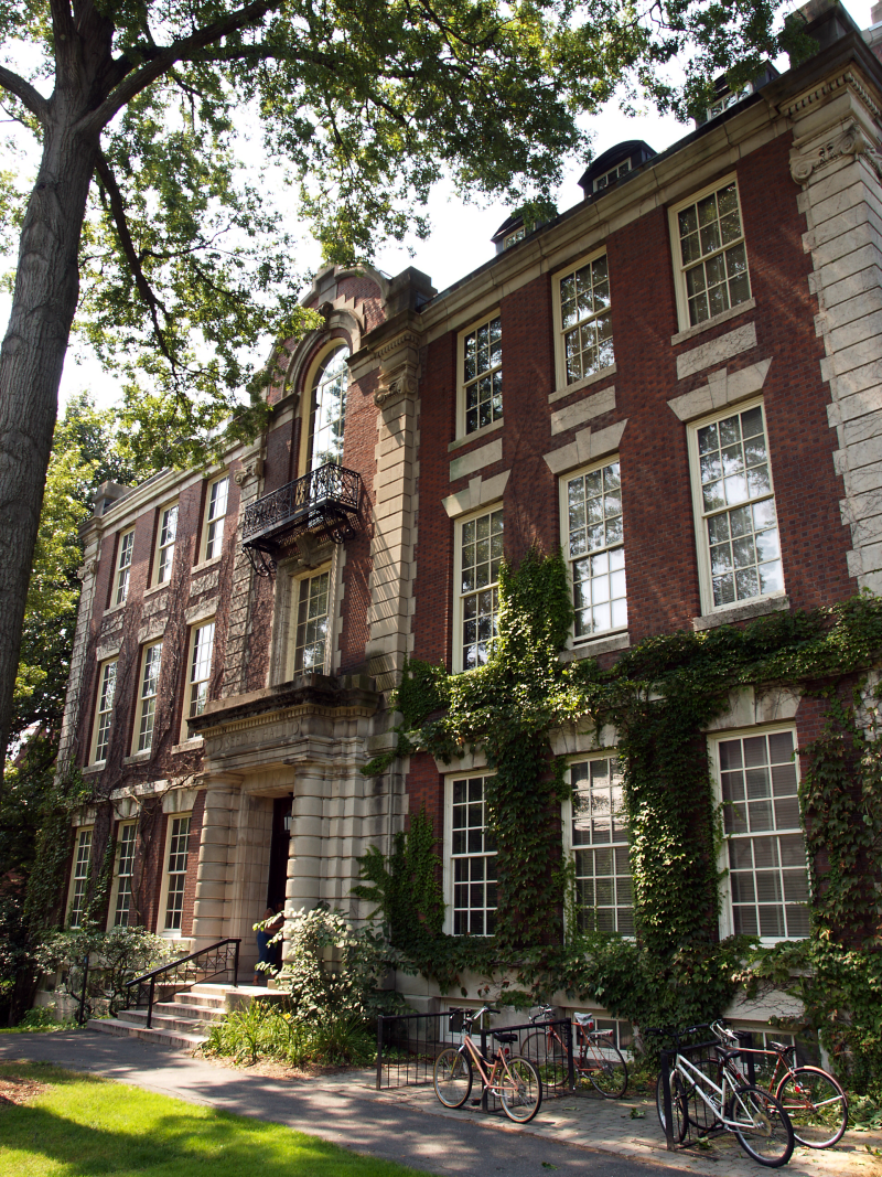 Photo of Seelye Hall a brick building covered in ivy on the Smith College campus.