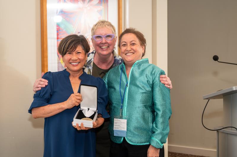 Yvette Colon poses with Dean Marianne Yoshioka and Director of Development Dawn Faucher during the summer 2024 Alumni Awards Dinner.