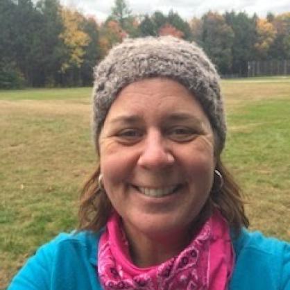 Karen Peters selfie with trees and field behind