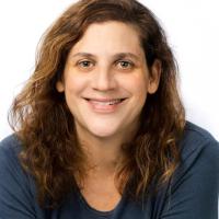 Danna Bodenheimer wearing blue shirt. White background