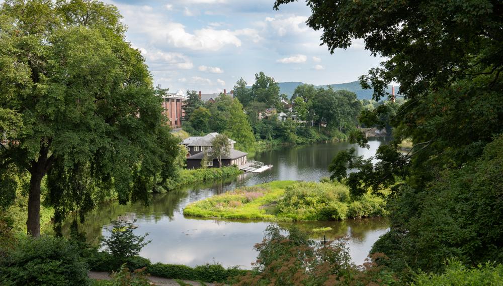 Paradise Pond at Smith College surrounded by lush greenery.