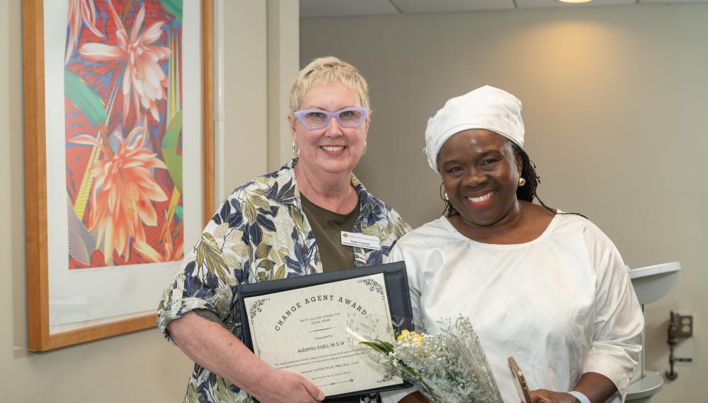 Adama Sallu poses with Director of Development Dawn Faucher during the Alumni Awards Dinner in June 2024.